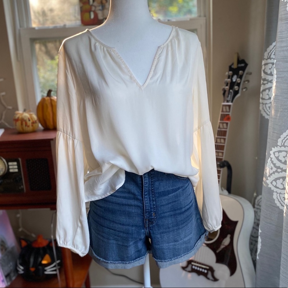 Cream statement sleeve blouse
